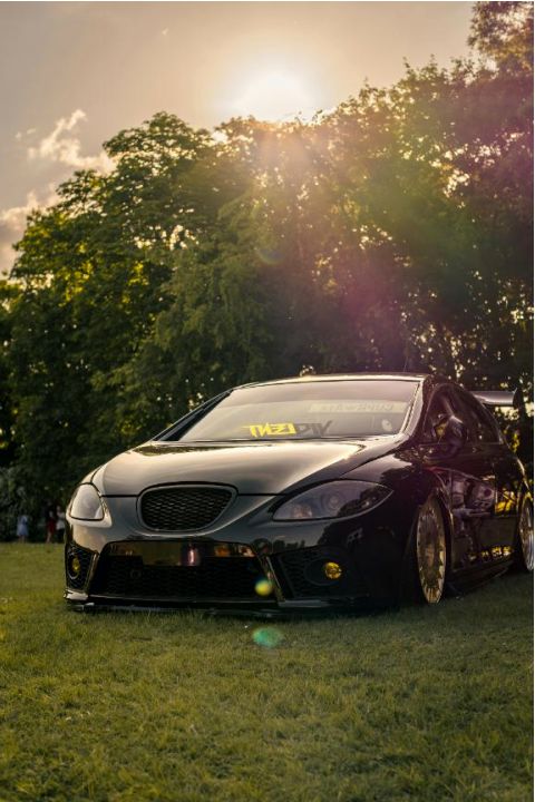 Student driving a hatchback
